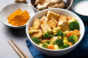 Stir fried tofu with vegetables and satay sauce