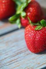 fresh strawberries on wooden table