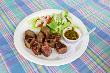 Grilled steak meat with vegetable salad
