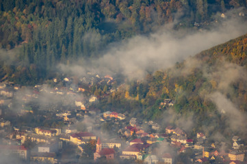 Morning fog in autumn mountains