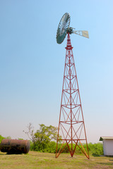 windmill against a blue sky