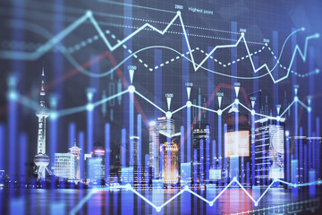 Financial graph on night city scape with tall buildings background double exposure. Analysis concept.