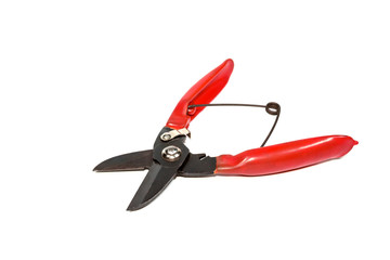 red garden scissors on white isolated background