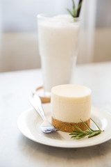 Mini Cheesecake and Coconut Smoothie on Table