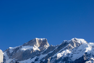 Landscape with snow mountains. Travel, alpinism concept. Copy space