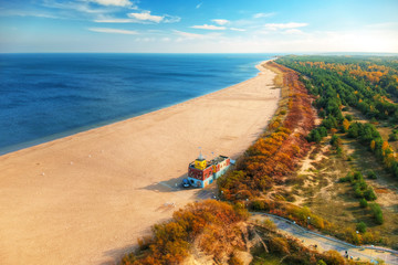 Aerial landscape of the beautiful beach with lifeguards house at Baltic Sea in Gdansk, Poland - obrazy, fototapety, plakaty