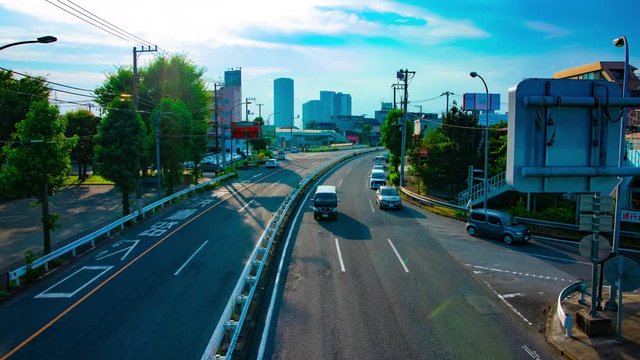 A timelapse of downtown street at Kanpachi avenue in Tokyo daytime wide shot