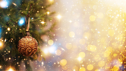 Obraz na płótnie Canvas Christmas and New Year holidays background. Glitter lights backdrop. Winter season. Text space. Closeup of Christmas-tree. Elements of this Image Furnished by NASA.