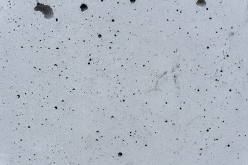 Realistic texture of porous concrete surface with cavities.