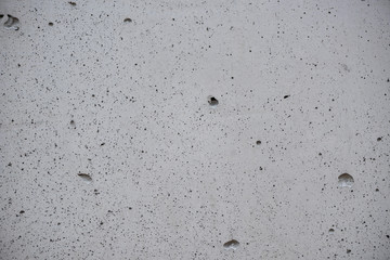 Realistic texture of porous concrete surface with cavities.