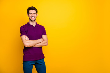 Portrait of his he nice attractive cheerful cheery content brown-haired guy folded arms copy space...