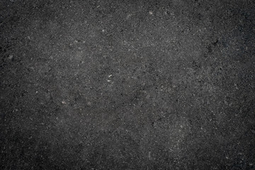 Dark grey stone texture. Background with rough surface