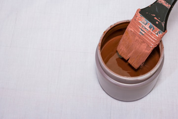 paintbrush paint on gray cloth