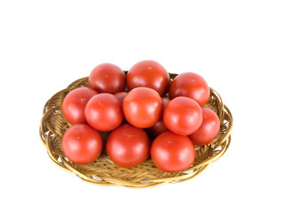 Tomatoes on a plate on a white background