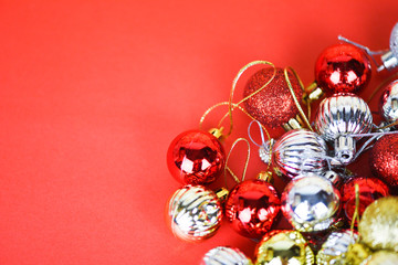 Christmas ball decoration for pine tree with colorful golden silver and red balls holiday red background / christmas tree festive xmas winter and Happy New Year object