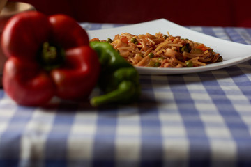 Spanish dish with pasta, vegetables and fish called Fideua