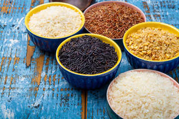 Different types of rice, white basmati, jasmine, arborio, brown and black