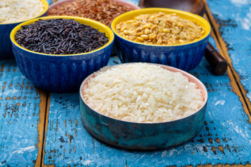 Different types of rice, white basmati, jasmine, arborio, brown and black