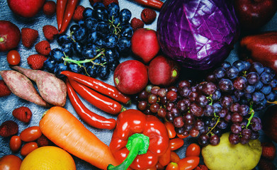 Fresh red fruit and purple red vegetables mixed background , top view various for healthy food vegan cook - Healthy food selection clean eating for heart life cholesterol diet health concept