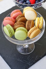Bowl of colorful macaron cookies