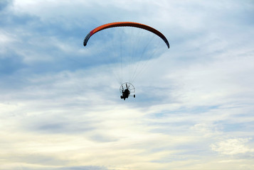 a Moto paraglider in the air