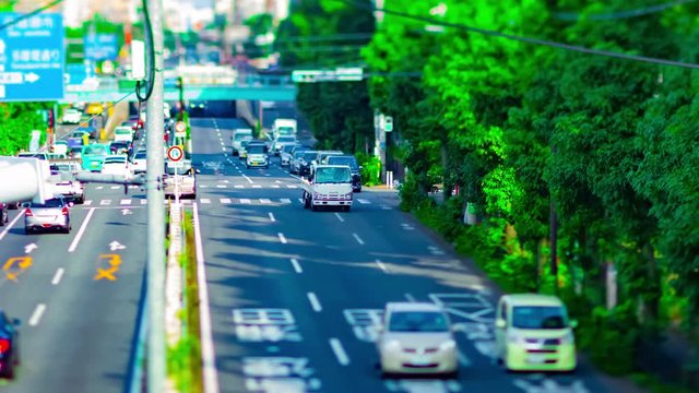 A timelapse of miniature street at Kanpachi avenue in Tokyo daytime tiltshift panning