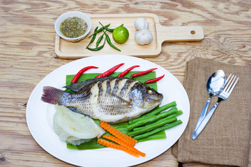 Steamed Nilotica fish,thai style steamed fish with vegetable