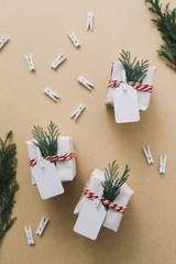 Small gift boxes with cypress branches