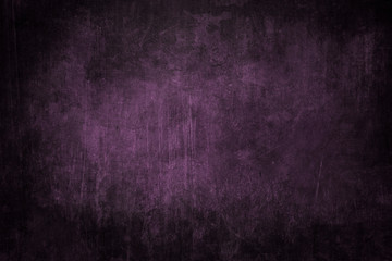 Obraz na płótnie Canvas Dark purple grungy background or texture