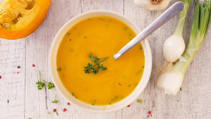 pumpkin soup with cream and herbs