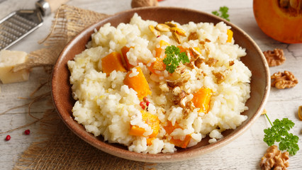 pumpkin risotto with walnut and cheese, top view