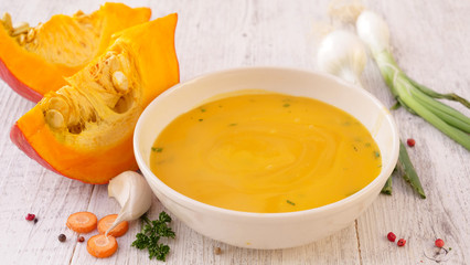 pumpkin soup with cream and herbs