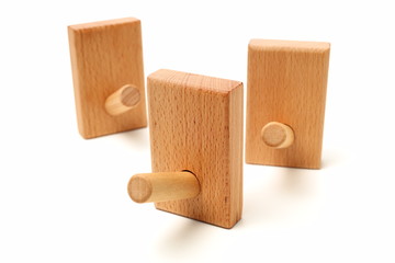 Wooden abstract wall hook isolated on white background