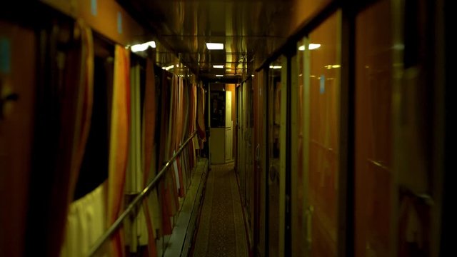 Concept view of moving renewed soviet second class coupe ammendorf express passenger train sleeping car railway summer evening 4k