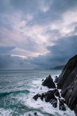 coumeenoule harbour in south west ireland on the dingle peninsula on an autumn evening near sunset,...