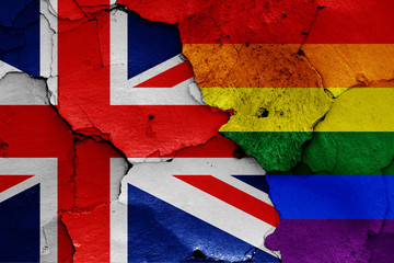 flags of UK and LGBT painted on cracked wall