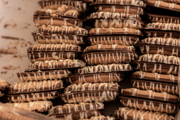 Sale of double cookies, chocolate and cream in street market