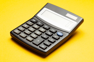 Calculator on a yellow background