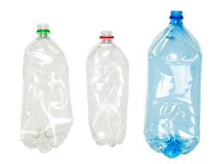 Crumpled plastic bottles isolated on white background.