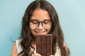 Female Child Eagerly Waiting To Eat Unhealthy Dessert
