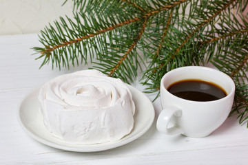 Desserts for winter parties. Sweets and spruce branch.