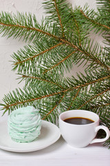 Desserts for winter parties. Sweets and spruce branch.