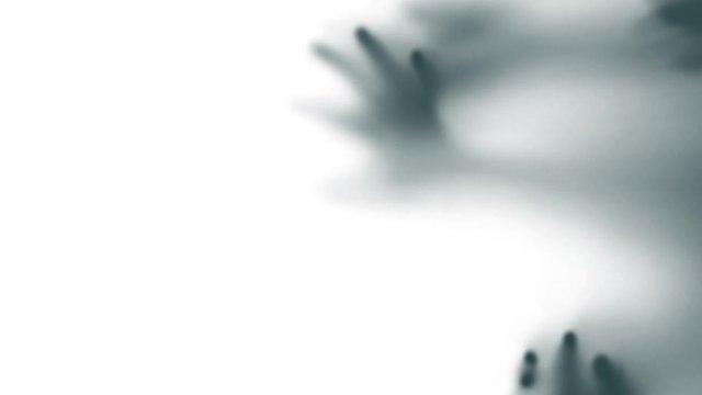 Abstract and spooky defocused hand in slow motion