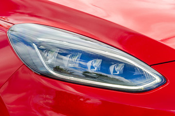 Front light of a red car
