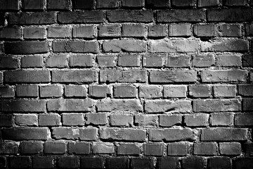 close up on a black and white  bricks wall