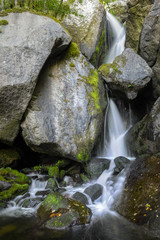 Waterfall between Gigantic Granitic Boulders