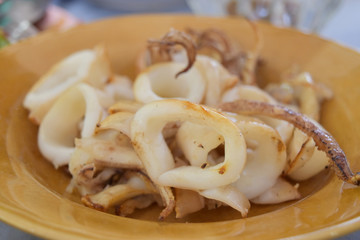 Famous delicious grilled squid seafood plate in restaurant.
