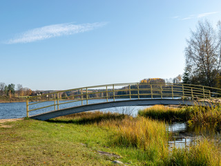 landscape with colorful trees and small lake, beautiful reflections