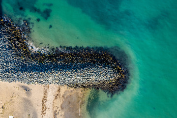 Top down aerial view of Breakwater and sea in Bray , Ireland.