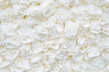 flower paper-craft texture background. unnatural artificial flowers. White rose.